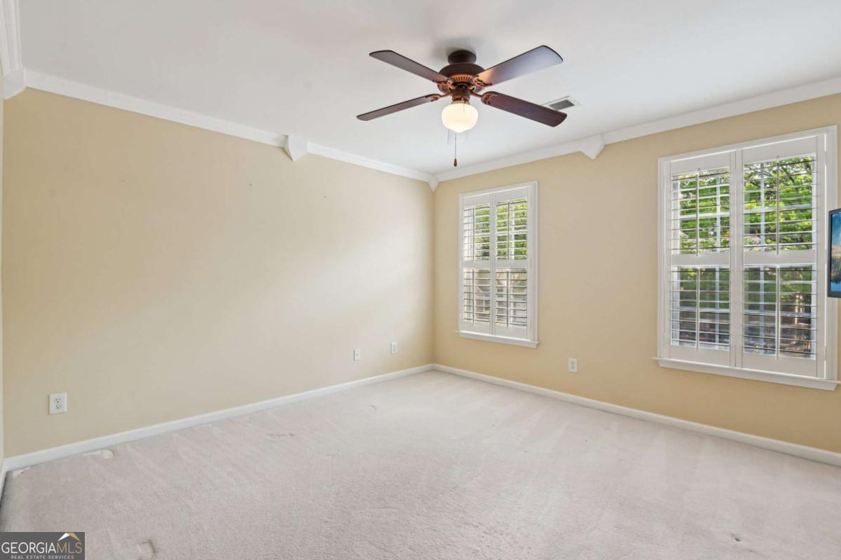 3180 The Commons Drive Cumming, GA 30041 - Photo 45 of 84 a view of an empty room with a window