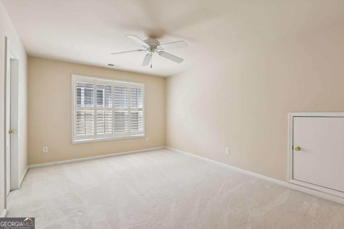 3180 The Commons Drive Cumming, GA 30041 - Photo 53 of 84 a view of an empty room with a window