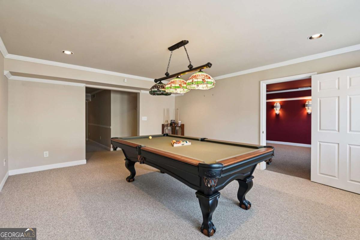 3180 The Commons Drive Cumming, GA 30041 - Photo 72 of 84 a room with pool table and windows