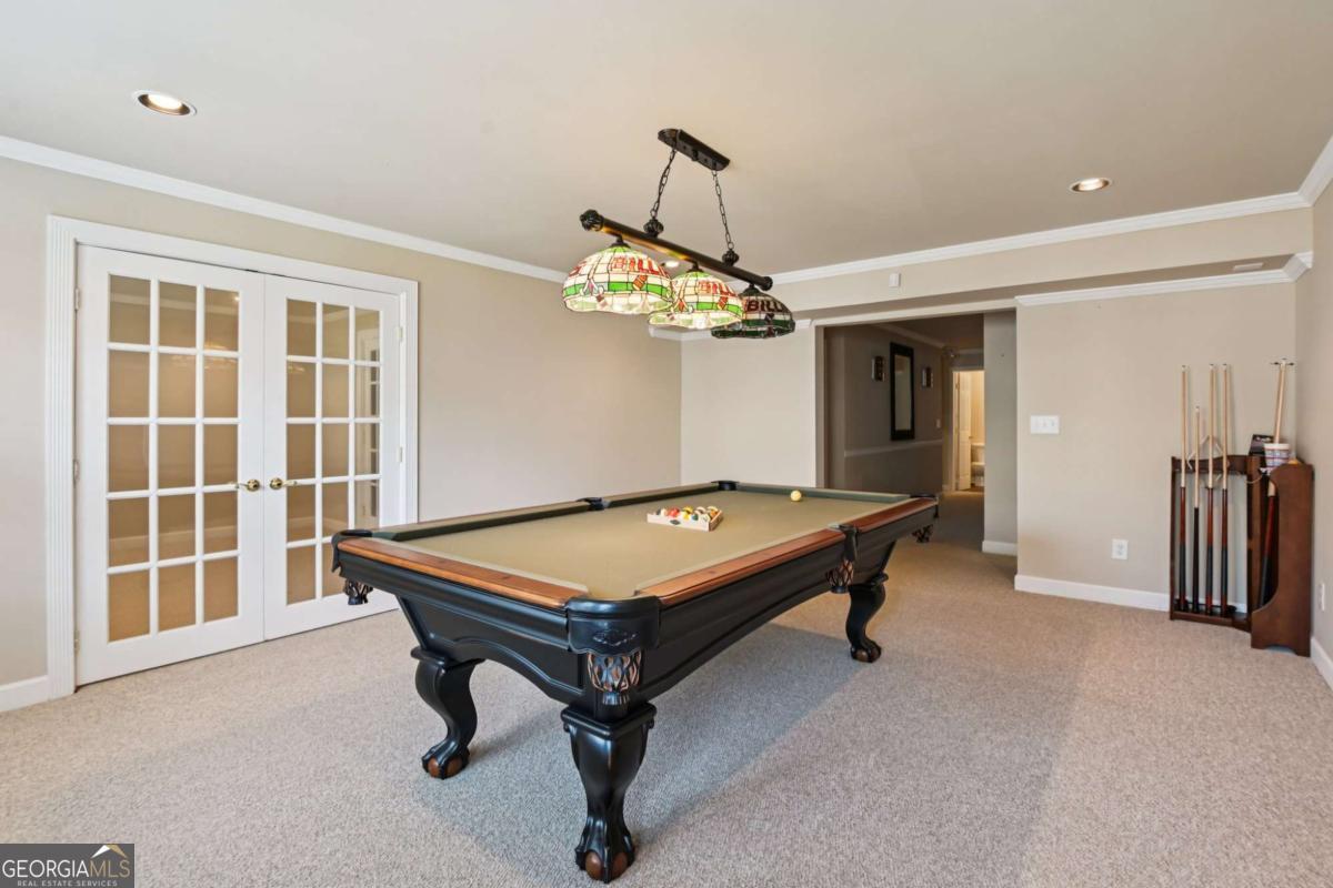 3180 The Commons Drive Cumming, GA 30041 - Photo 73 of 84 a room with pool table and windows