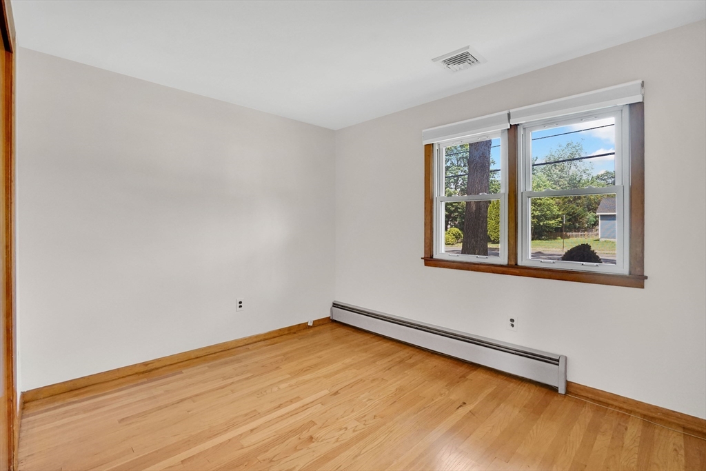 1133 Burnett Road Chicopee, MA 01020 - Photo 18 of 40 an empty room with a window