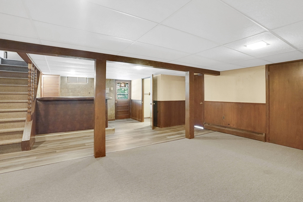 1133 Burnett Road Chicopee, MA 01020 - Photo 26 of 40 an empty room with entrance and windows