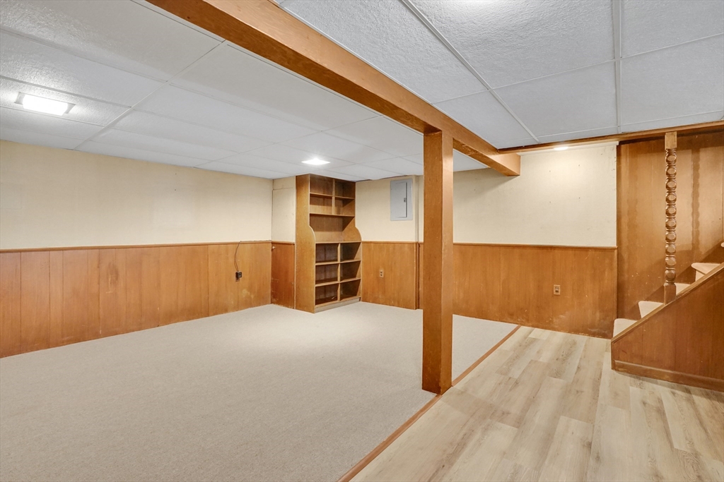 1133 Burnett Road Chicopee, MA 01020 - Photo 29 of 40 a view of an empty room with wooden floor