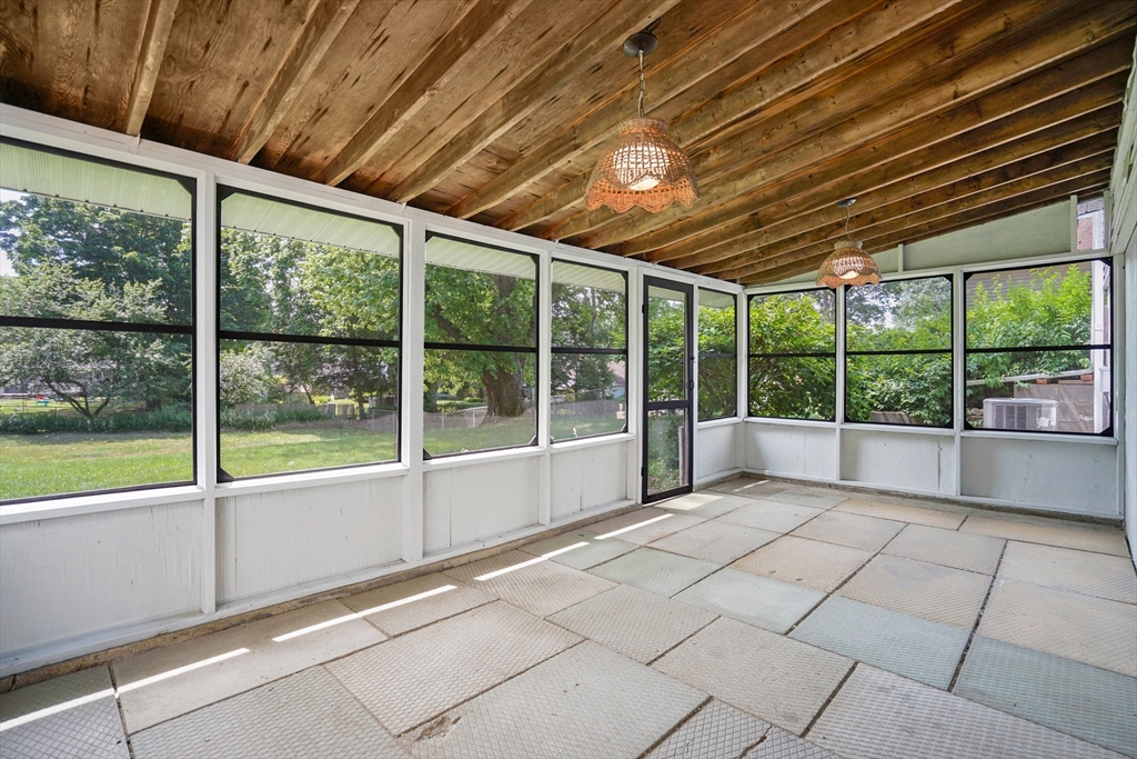 1133 Burnett Road Chicopee, MA 01020 - Photo 33 of 40 a view of an empty room with a large window