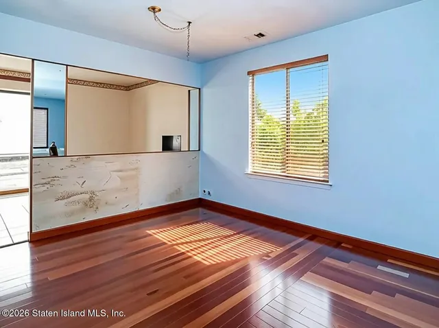 a kitchen with a stove and a refrigerator