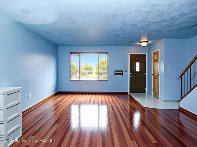 a view of an empty room and window