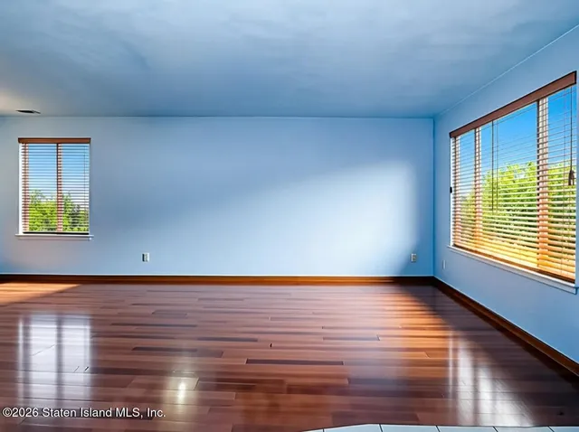 a view of an empty room and window