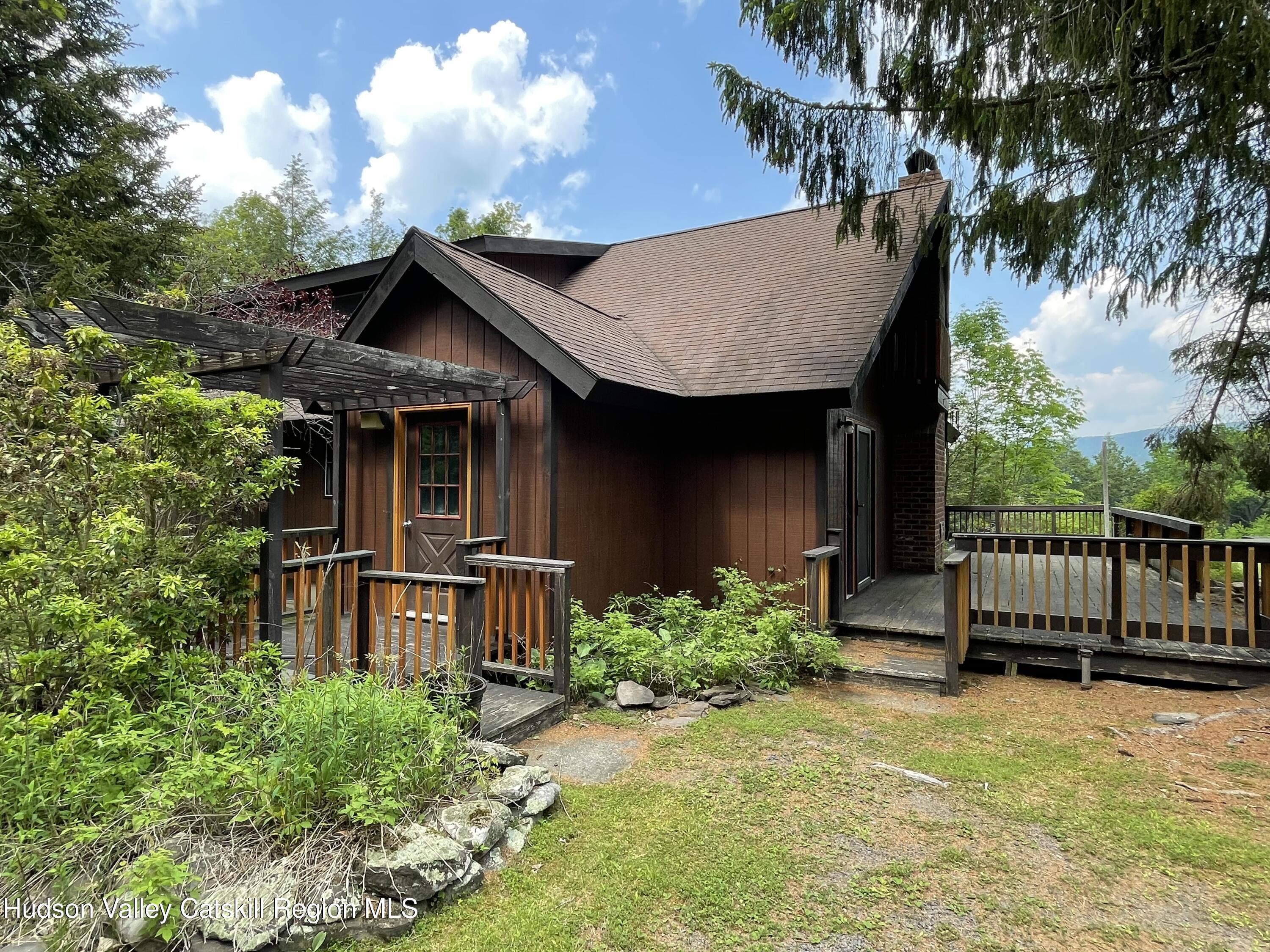 27 Terrace Drive Lexington, NY 12468 - Photo 6 of 37 a backyard of a house with seating space