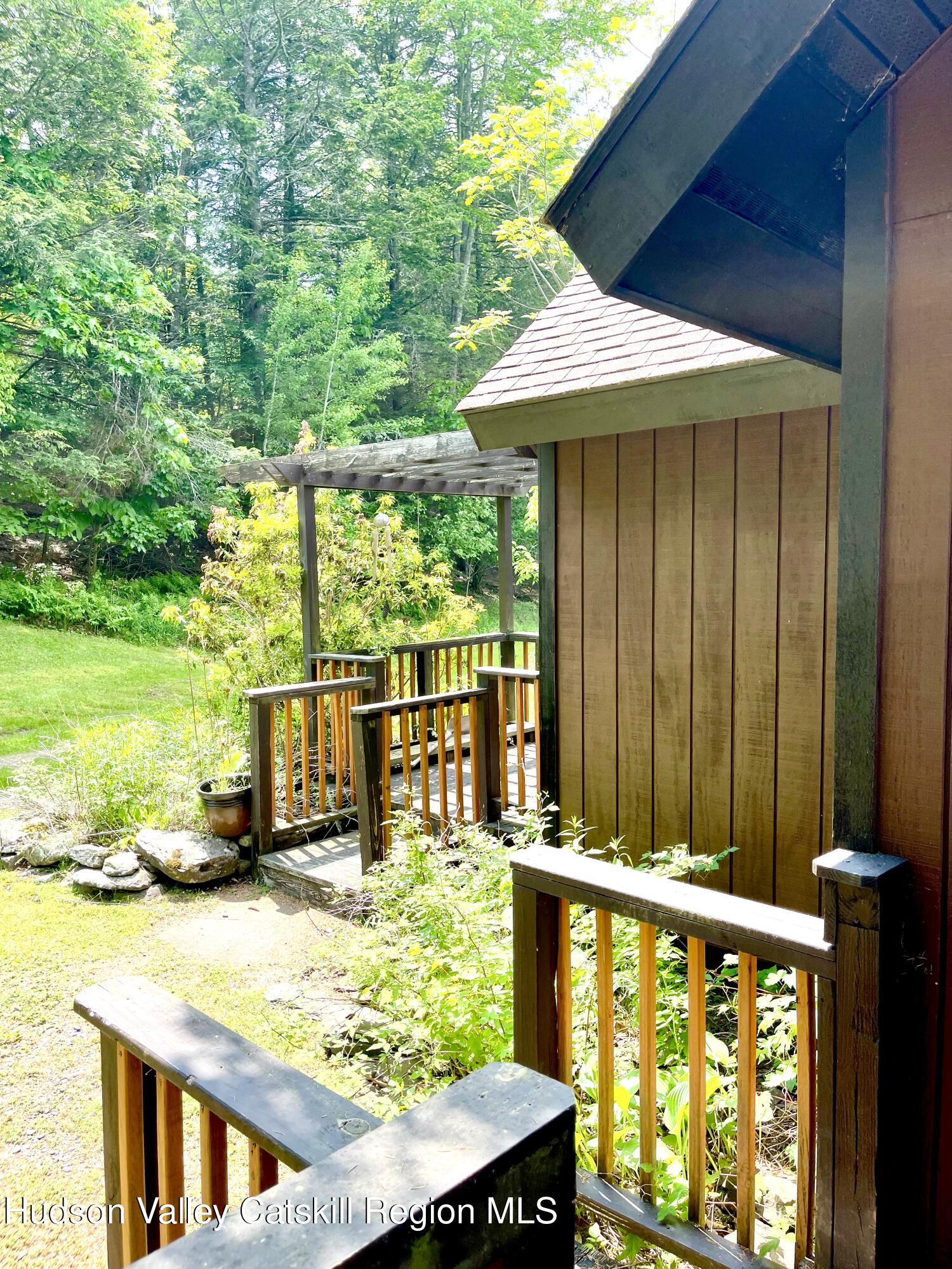 27 Terrace Drive Lexington, NY 12468 - Photo 8 of 37 a view of a balcony with wooden floor