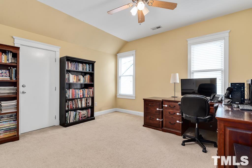 216 Frontgate Drive Cary, NC 27519 - Photo 25 of 26 a view of a livingroom with workspace and a window