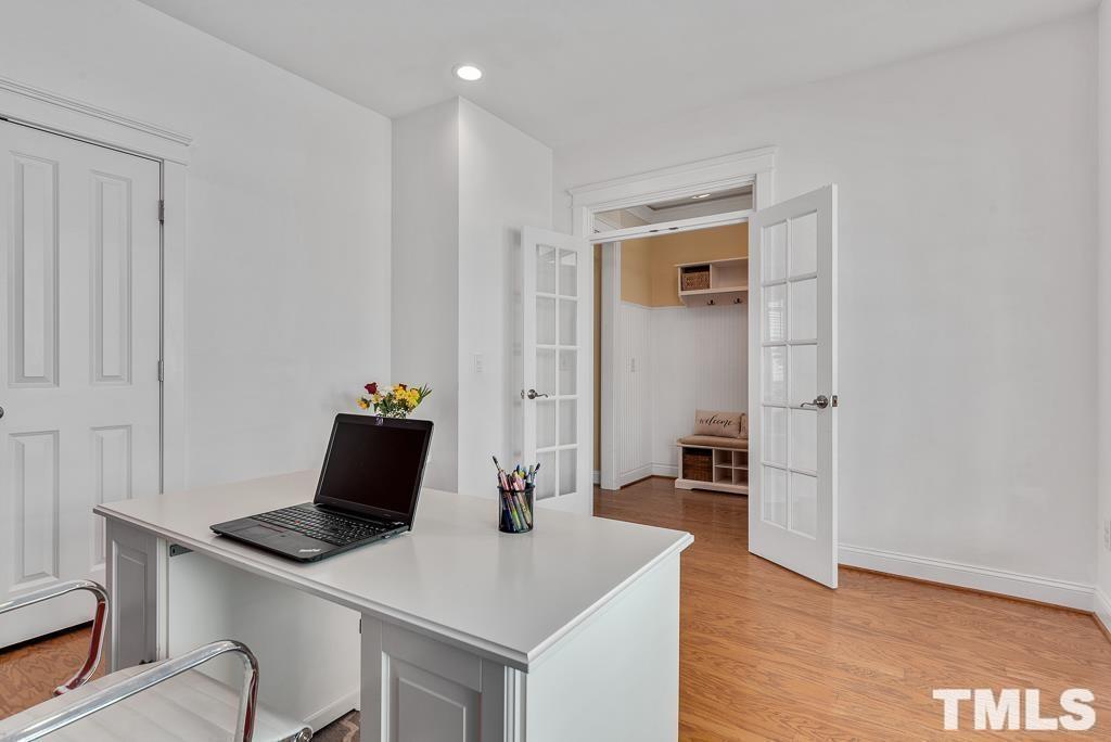 216 Frontgate Drive Cary, NC 27519 - Photo 6 of 26 a view of kitchen with a table and chairs