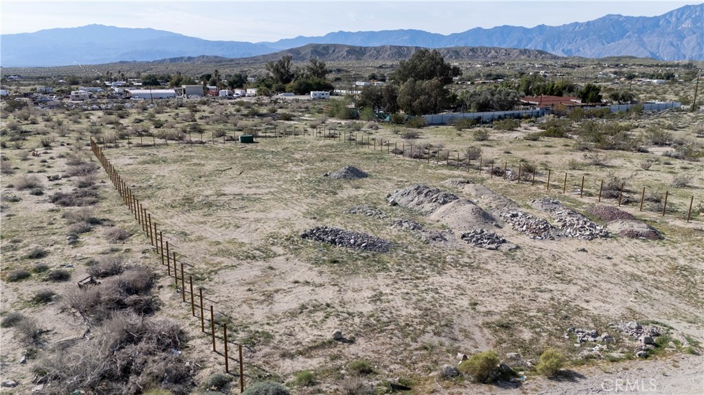 65 Dillon Road Desert Hot Springs, CA 92241 - Photo 3 of 24 a view of a town with mountains in the background