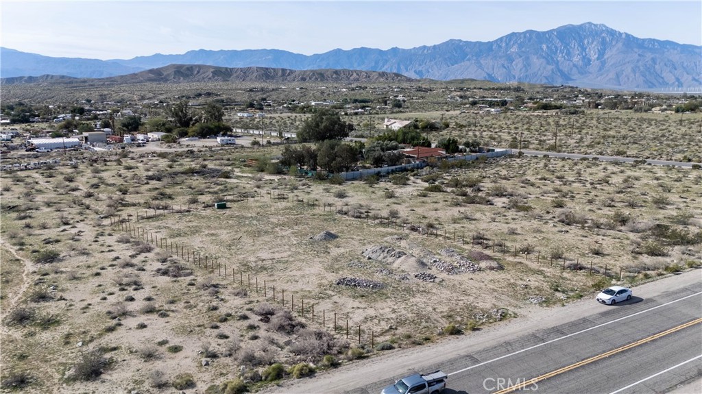 65 Dillon Road Desert Hot Springs, CA 92241 - Photo 4 of 24 a view of a mountain with a outdoor space
