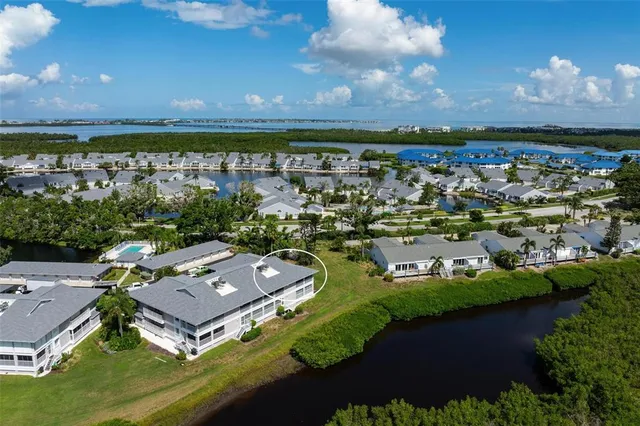 an aerial view of a house with a garden