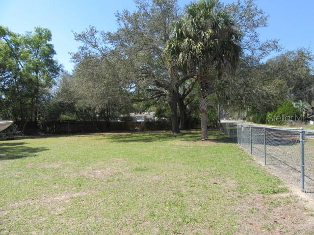 Southeast 102nd Court Road Summerfield, FL 34491 - Photo 3 of 10 a view of a backyard