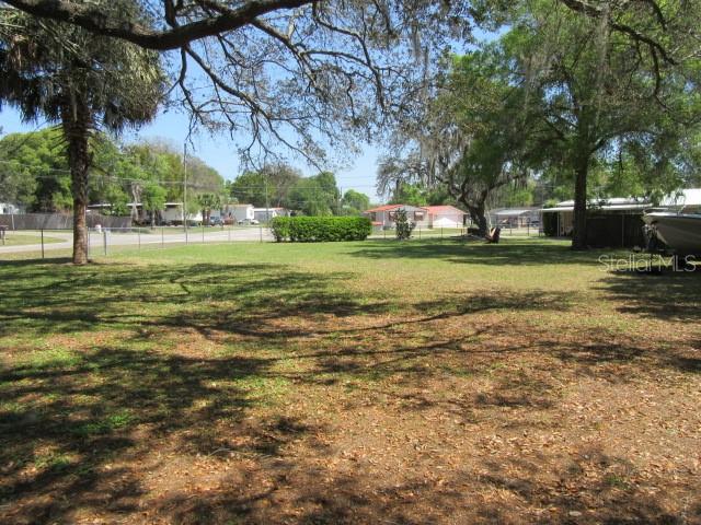 Southeast 102nd Court Road Summerfield, FL 34491 - Photo 4 of 10 a view of a field with trees