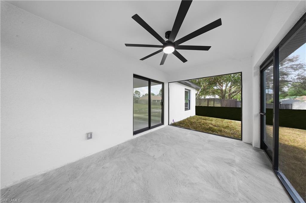 3406 25th Street Southwest Lehigh Acres, FL 33976 - Photo 28 of 44 a view of an empty room and window