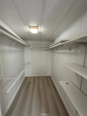 a view of a room with racks on the wall