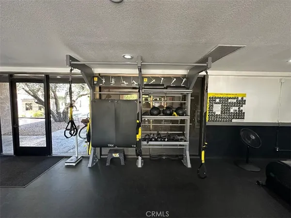 a view of a room with gym equipment