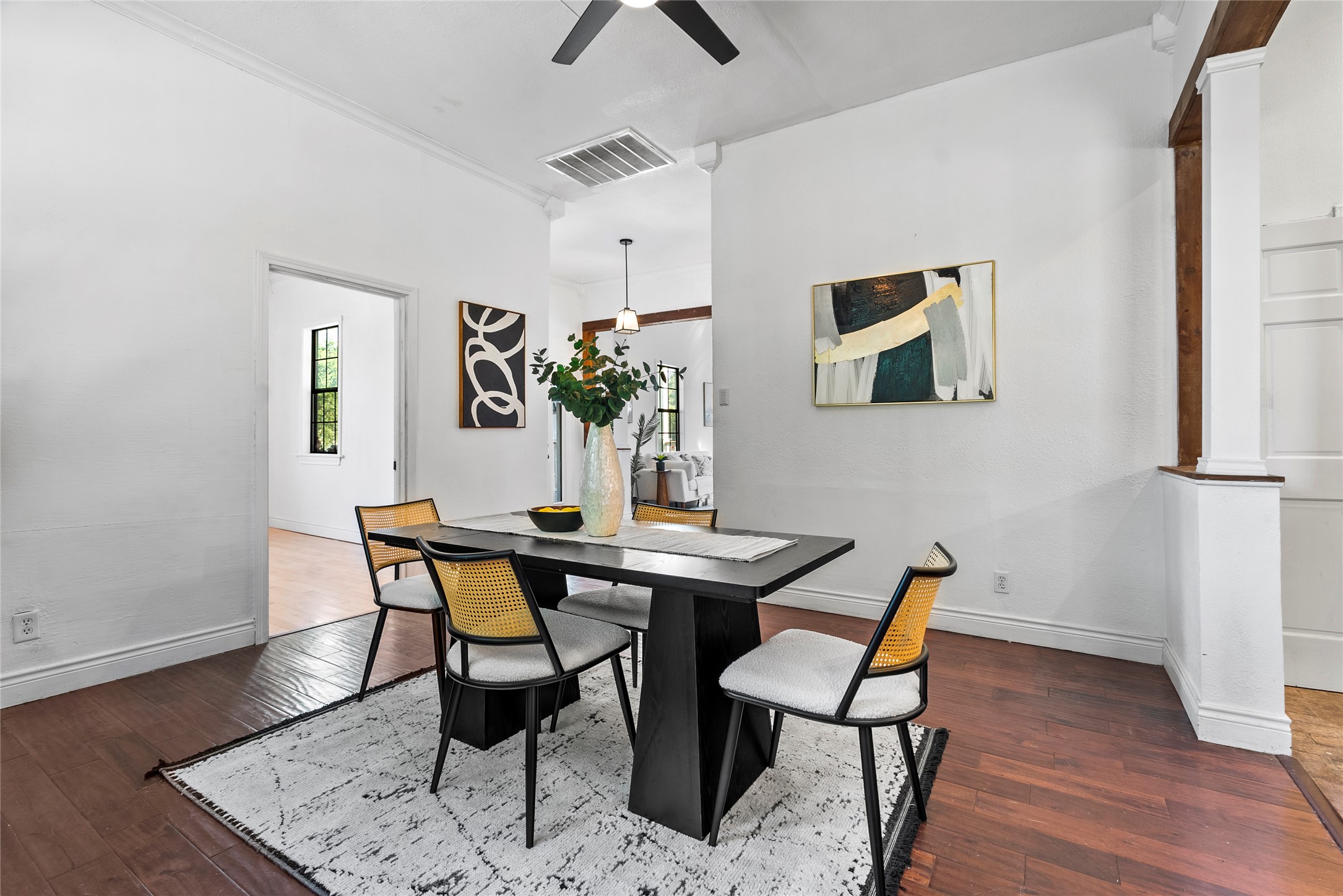 1011 Porter Street Taylor, TX 76574 - Photo 12 of 35 a view of a dining room with furniture and wooden floor
