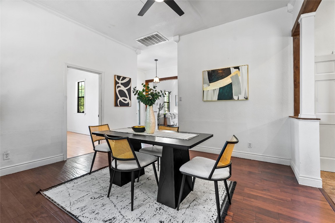 1011 Porter Street Taylor, TX 76574 - Photo 12 of 35 a view of a dining room with furniture and wooden floor