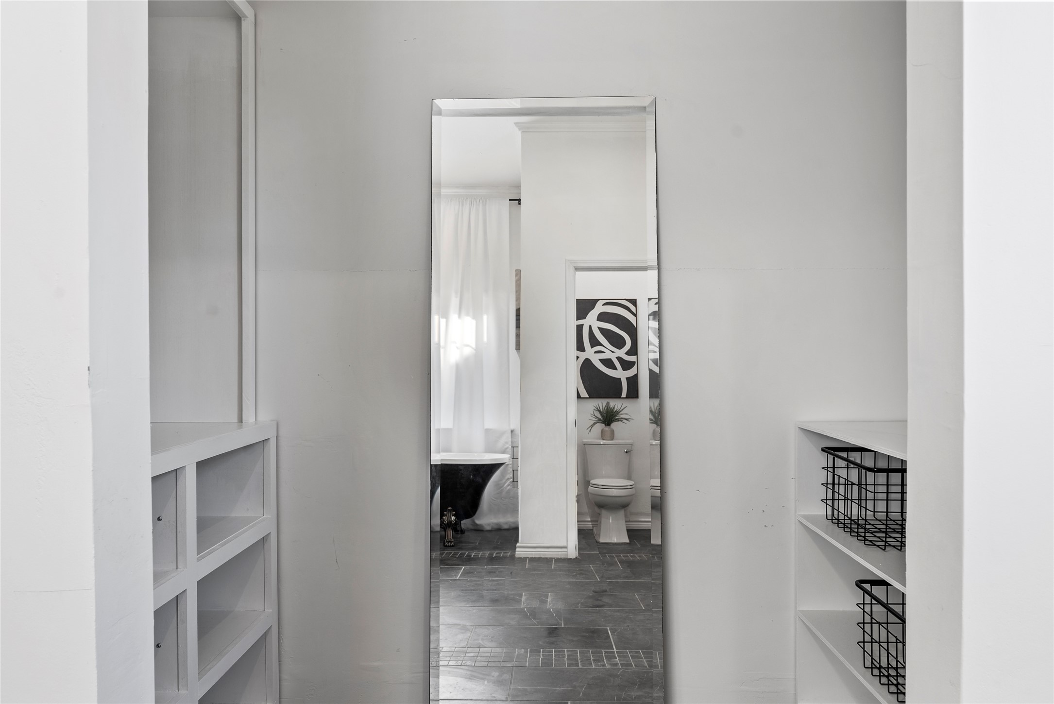 1011 Porter Street Taylor, TX 76574 - Photo 21 of 35 There's also a walk-in closet with built in storage options.