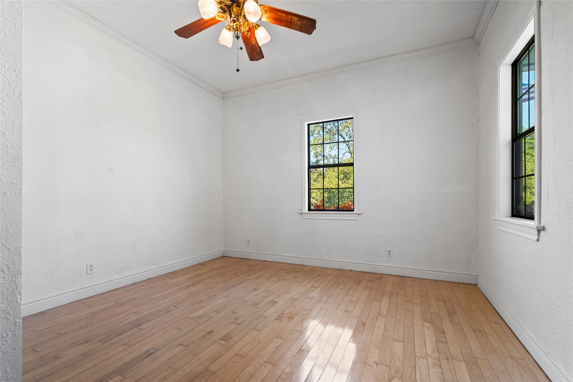 1011 Porter Street Taylor, TX 76574 - Photo 23 of 35 an empty room with a window