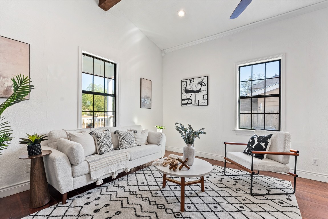 1011 Porter Street Taylor, TX 76574 - Photo 3 of 35 a living room with furniture and wooden floor