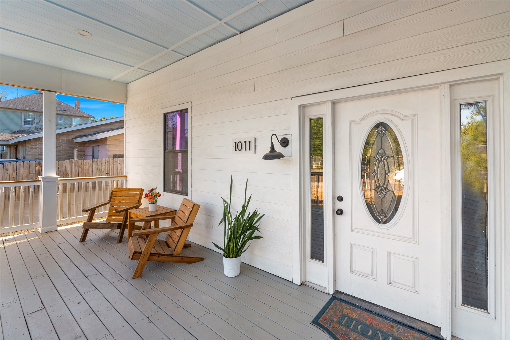 1011 Porter Street Taylor, TX 76574 - Photo 7 of 35 a living room with furniture and a wooden floor
