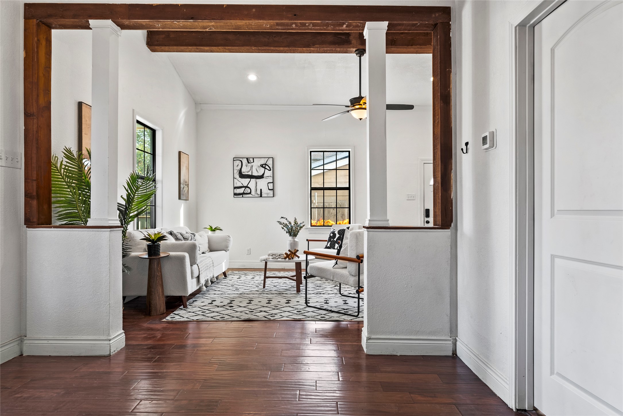1011 Porter Street Taylor, TX 76574 - Photo 9 of 35 a living room with furniture and a wooden floor