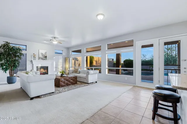 a view of a backyard with sitting area