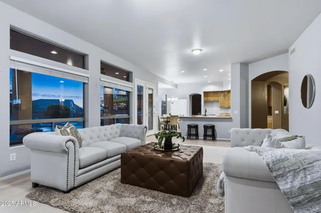 a view of a house with swimming pool and porch