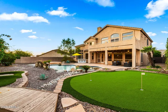 a view of balcony with furniture and city view