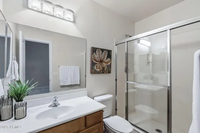 a view of a chairs and table in patio