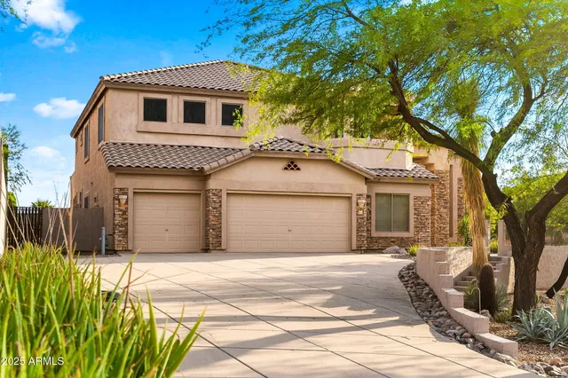 a view of entryway and hall with a front door