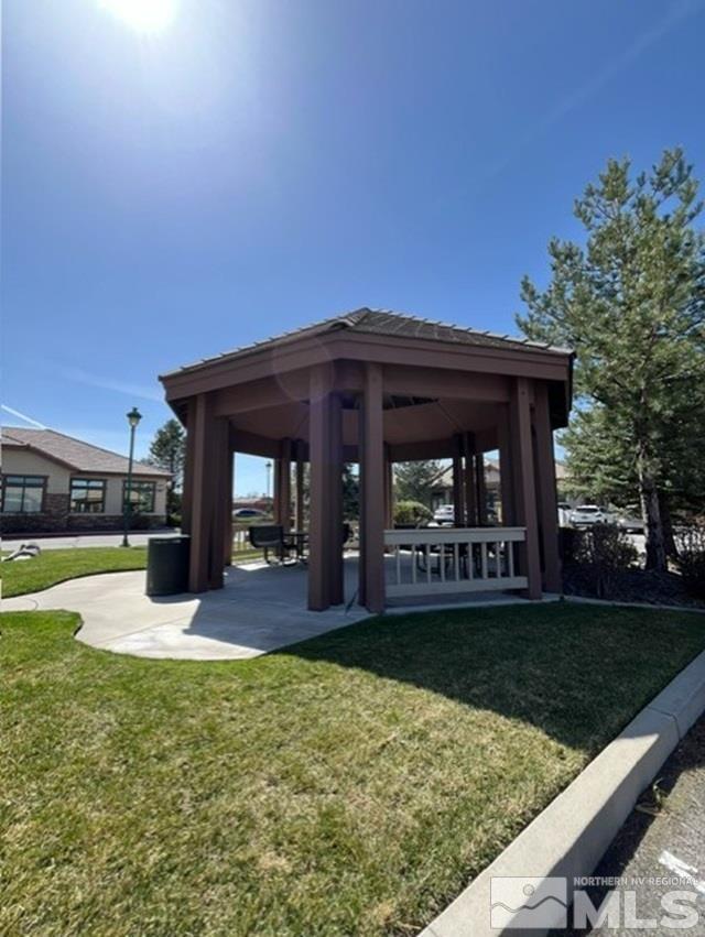 140 West Huffaker Lane, Unit 506 506 Reno, NV 89511 - Photo 11 of 15 a view of a house with swimming pool and a yard