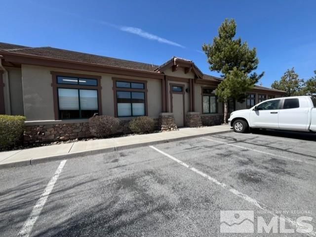140 West Huffaker Lane, Unit 506 506 Reno, NV 89511 - Photo 14 of 15 a view of a house with a yard