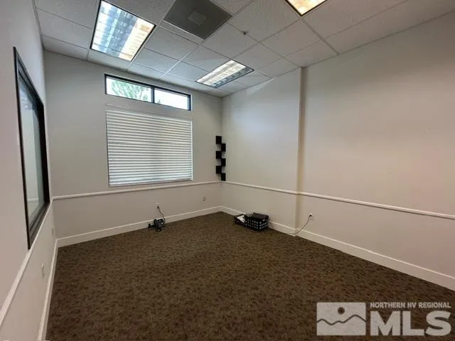 a view of a livingroom with a window