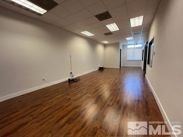 140 West Huffaker Lane, Unit 506 506 Reno, NV 89511 - Photo 5 of 15 a view of a room with wooden floor