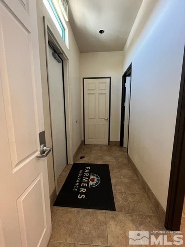 140 West Huffaker Lane, Unit 506 506 Reno, NV 89511 - Photo 8 of 15 a view of a hallway