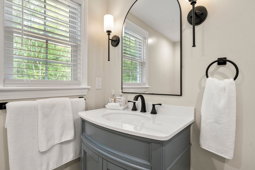 16 Churchill Road Plympton, MA 02367 - Photo 20 of 42 a bathroom with a sink and a mirror