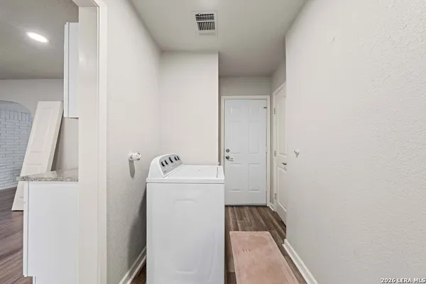 a utility room with dryer and washer