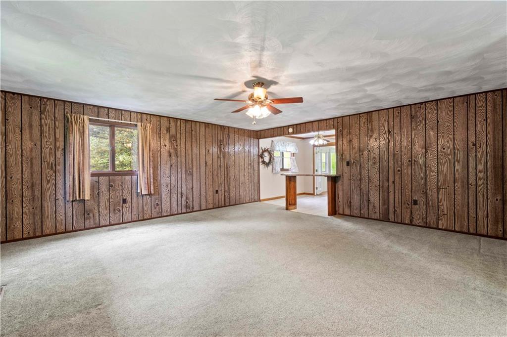 78 Cherryhill Road Indiana, PA 15701 - Photo 24 of 46 an empty room with chandelier fan and windows