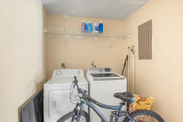 a utility room with dryer and washer