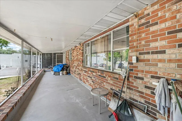 a view of an chairs and table in the balcony