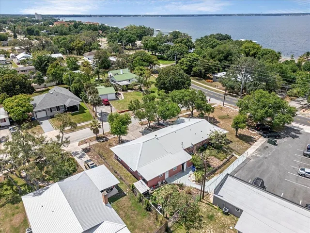 an aerial view of a house with a garden