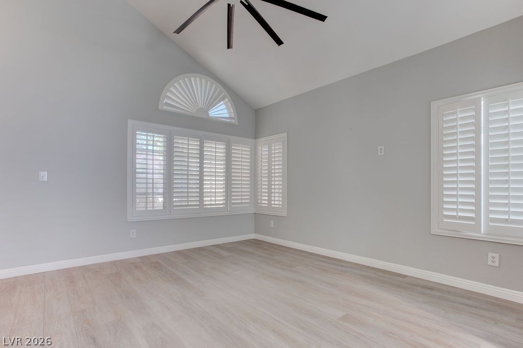1416 Walstone Road North Las Vegas, NV 89031 - Photo 7 of 47 Lofty ceilings and plantation shutters define this naturally illuminated, versatile space.