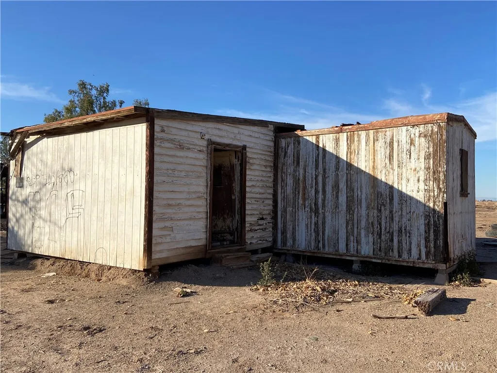 1896 East Underwood Road Holtville, CA 92250 - Photo 3 of 11 a view of a house with wooden fence
