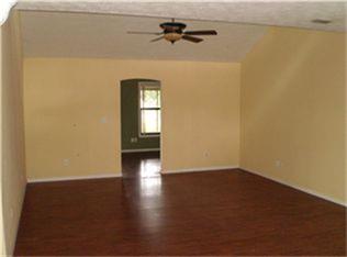 7626 Highway 60 Wallis, TX 77485 - Photo 6 of 6 an empty room with wooden floor and windows