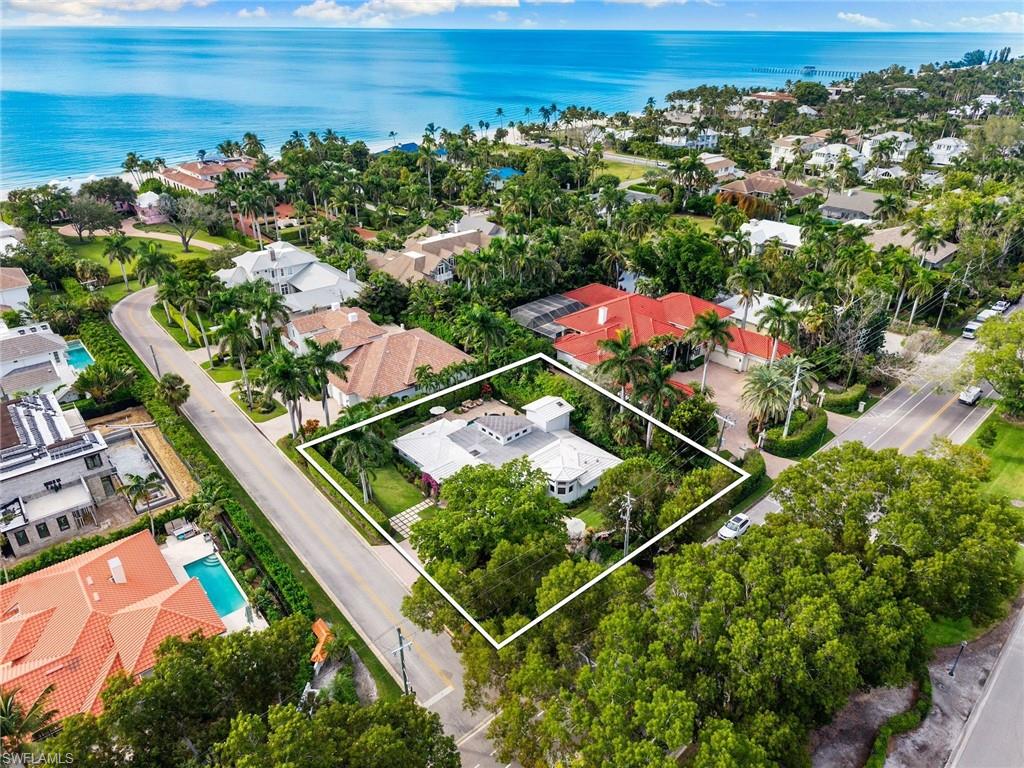 1980 Gordon Drive Naples, FL 34102 - Photo 3 of 14 an aerial view of residential houses with outdoor space